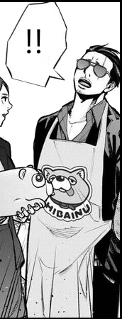 A scene from the manga Gokushufudou. A gangster with an apron featuring a silly shibainu as a mascot is saying '!!' to her wife, at the left of the panel.